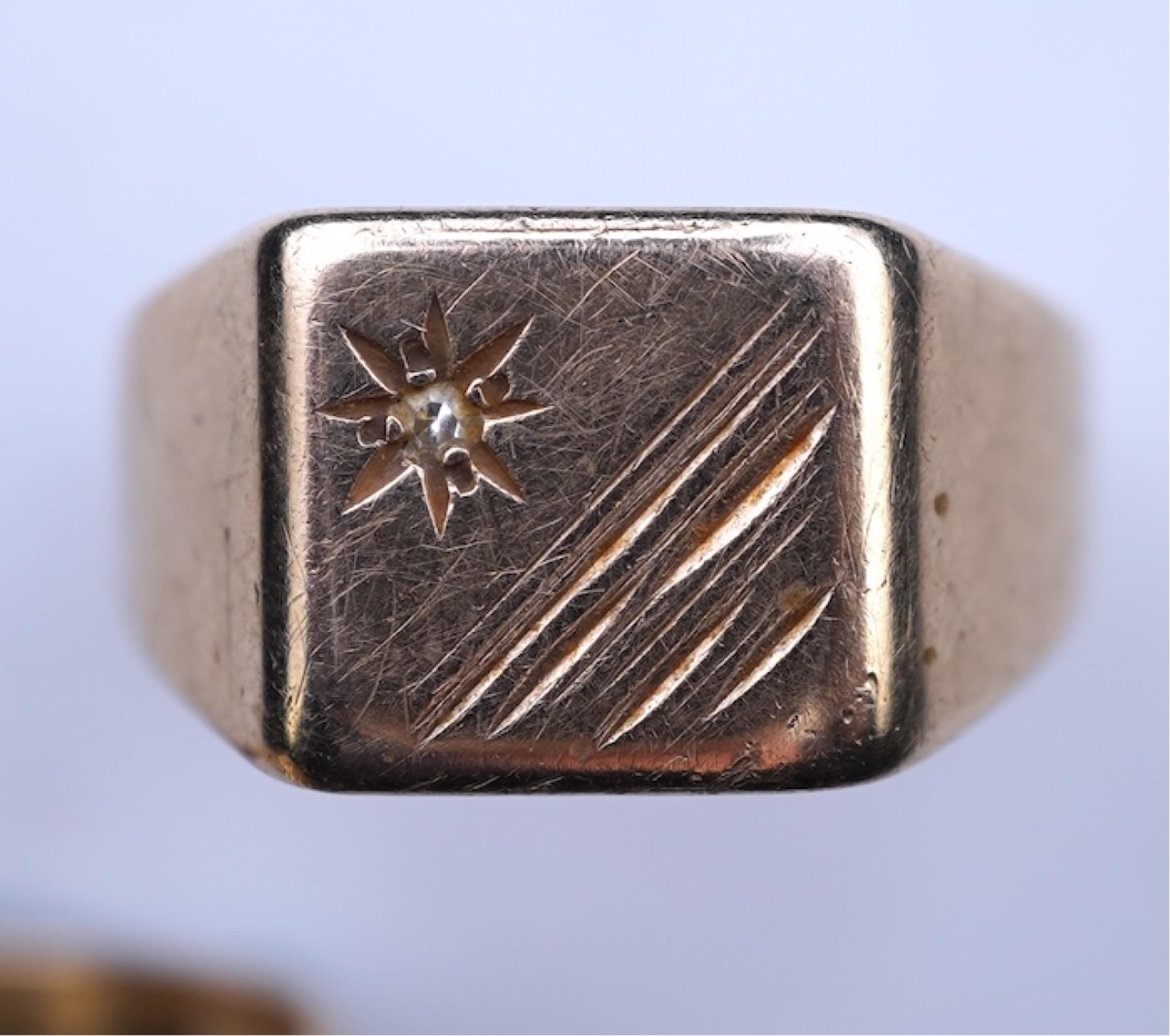 Two gold and diamond rings